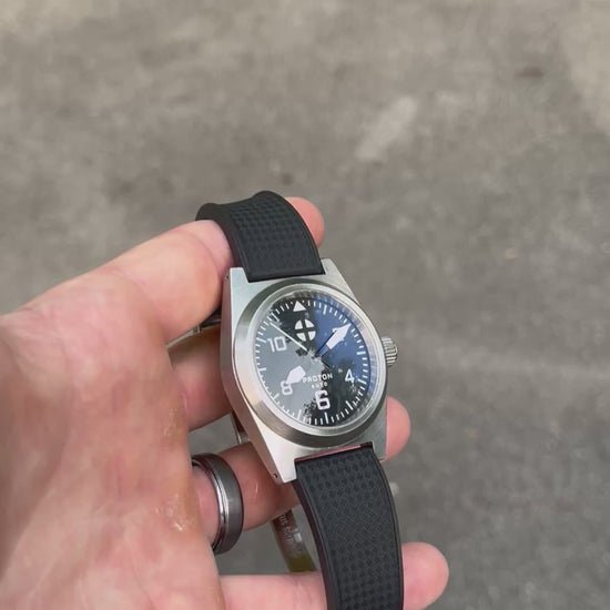 Video of automatic mechanical watch on black rubber strap and domed sapphire crystal